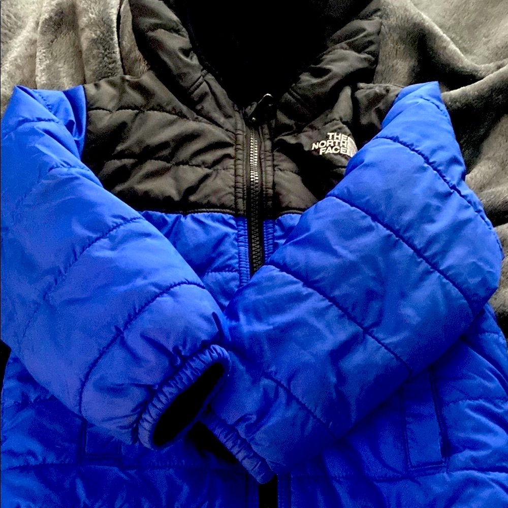 The North Face Black and Blue Sherpa Lined Puffer Jacket